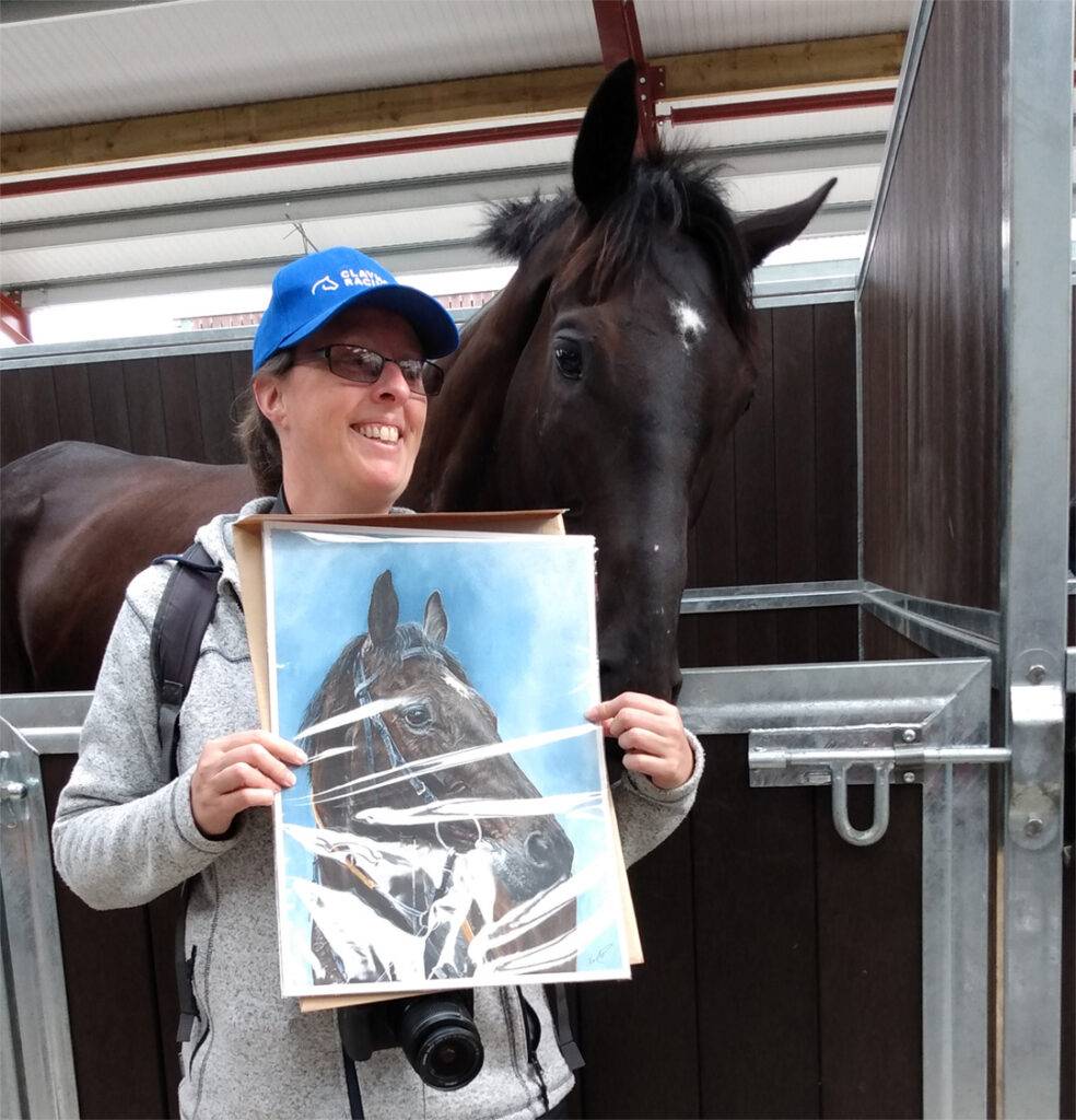 With King of Answers, posing with his painting I did of him